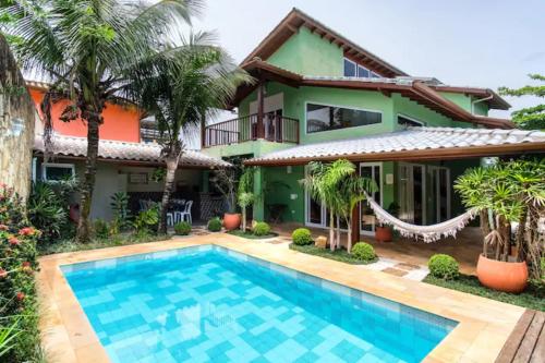 Ofertas en Elegante Casa em Condominio a 1 Quadra da Praia com Wifi, Piscina, Churrasqueira e Forno de Pizza (Casa o chalet), Ubatuba (Brasil)