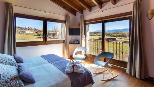 Ofertas en Les Feixes Llargues - Allotjament amb suites per 7 parelles (Bed & breakfast), Bolvir (España)
