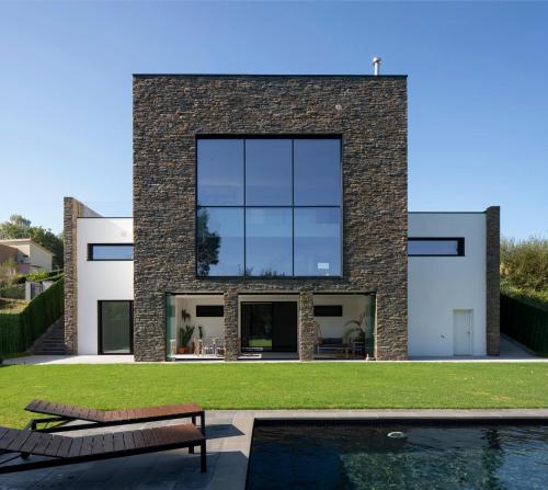Ofertas en Casa moderna con piscina y vistas al bosque. (Villa), Mungia (España)