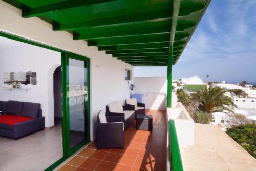Ofertas en Apartment Belinda with sea view, Sat-tv, Wifi, only 200m from Playa Grande (Apartamento), Puerto del Carmen (España)