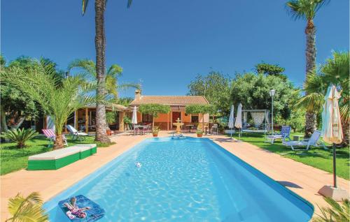 Ofertas en el Beautiful home in La Marina, Elche w/ WiFi, Outdoor swimming pool and 6 Bedrooms (Casa o chalet) (España)
