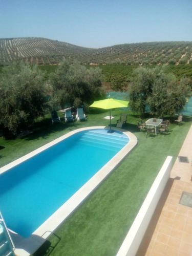 Ofertas en House with 4 bedrooms in Montilla Cordoba with wonderful mountain view shared pool enclosed garden 132 km from the beach (Casa o chalet), Jarata (España)