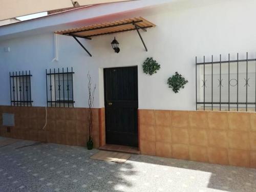 Ofertas en House with one bedroom in Sevilla with furnished garden and WiFi (Casa o chalet), Camas (España)