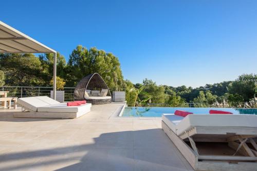 Ofertas en Luxury Private Holiday Villa with Sea Views, Ibiza Villa 1084 (Villa), Santa Eulària des Riu (España)