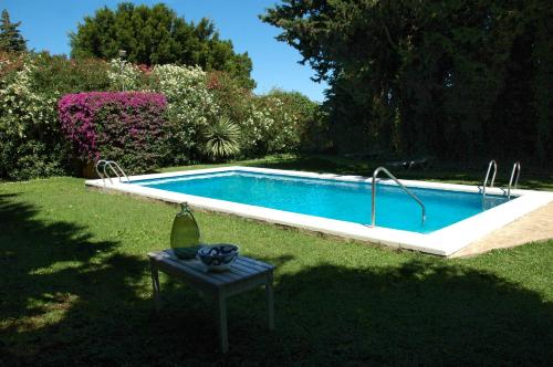 Ofertas en Villa Encarna alojamientos turísticos con piscina comunitaria (Apartamento), Conil de la Frontera (España)