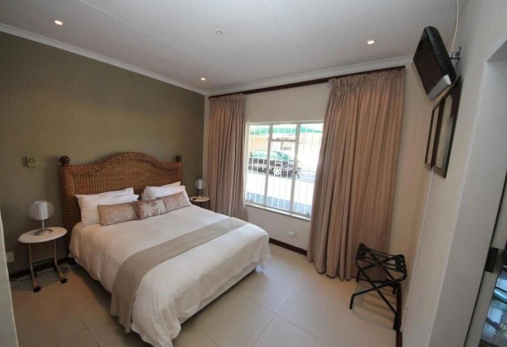 Hostal o pensión Room in Apartment - Beautiful Suite room in Bb - Close to Johannesburg