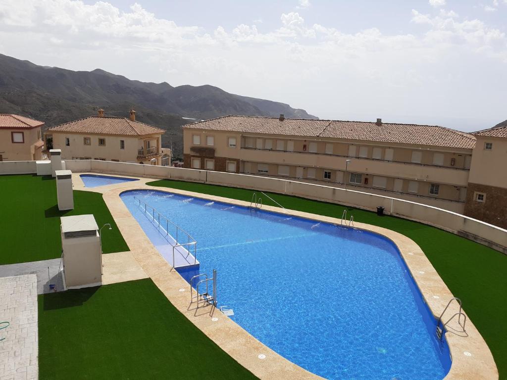 Apartamento La Envia Golf Vicar with terrace with view, 2 outdoors swimming pools, fitness center, free Wifi and garage Casas Nuestras Andalucia