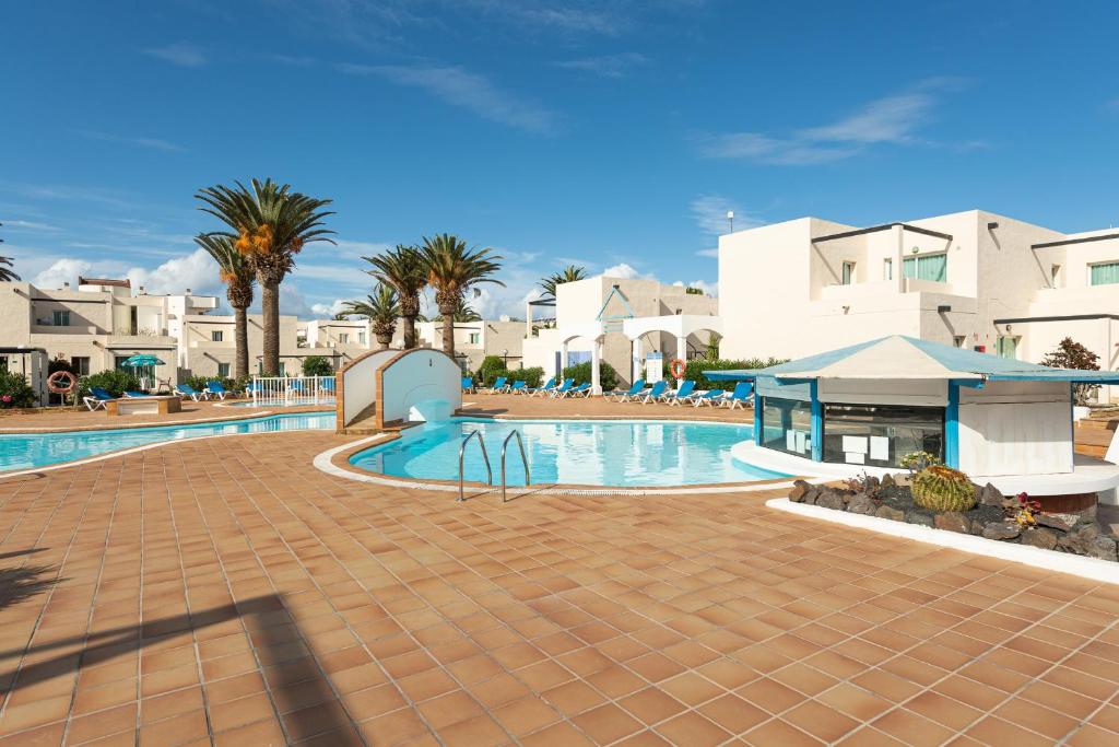 Apartahotel Apartamento 13 con terraza y piscina en Corralejo