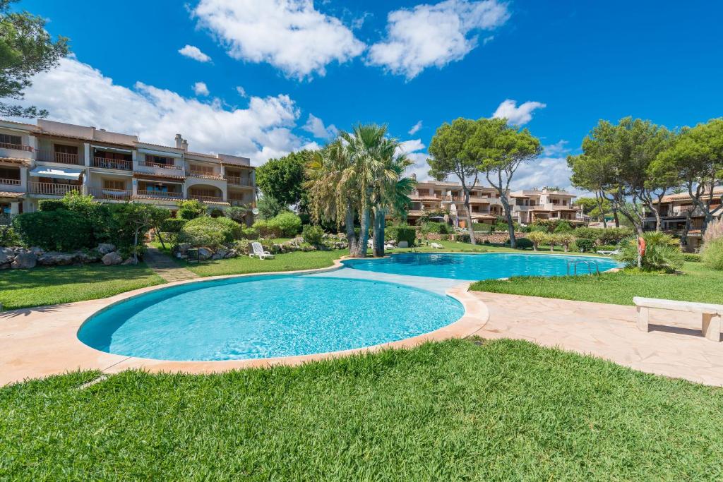 Apartamento Apartamento JARDIN REY COLAU con piscinas y vistas al mar, 100m de la playa Cala Marsal