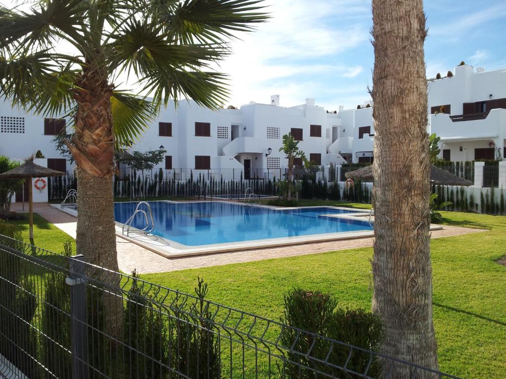 Apartamento Homes of Spain, Mar de Pulpi fase 1, Apartamento primera linea de playa, bajo con jardin y WIFI