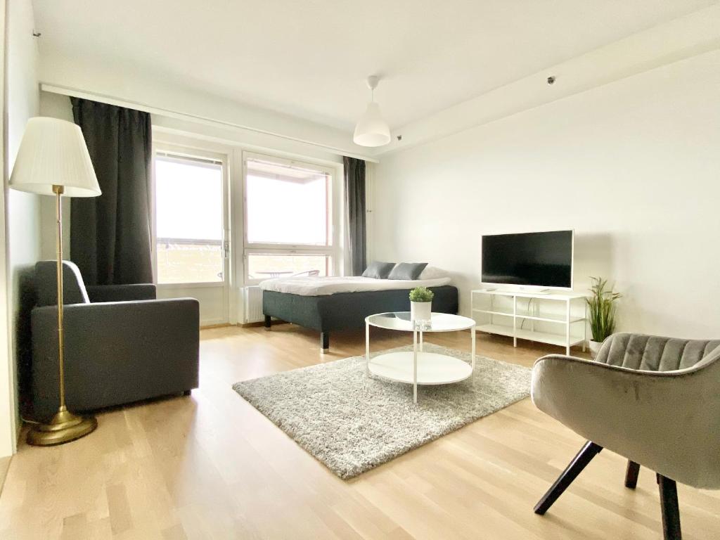 Apartamento City Home Finland Panorama Suite - New Luxury Suite with Own Sauna, One Bedroom, Spacious Balcony with City Views and Great Location next to Uros Live Arena