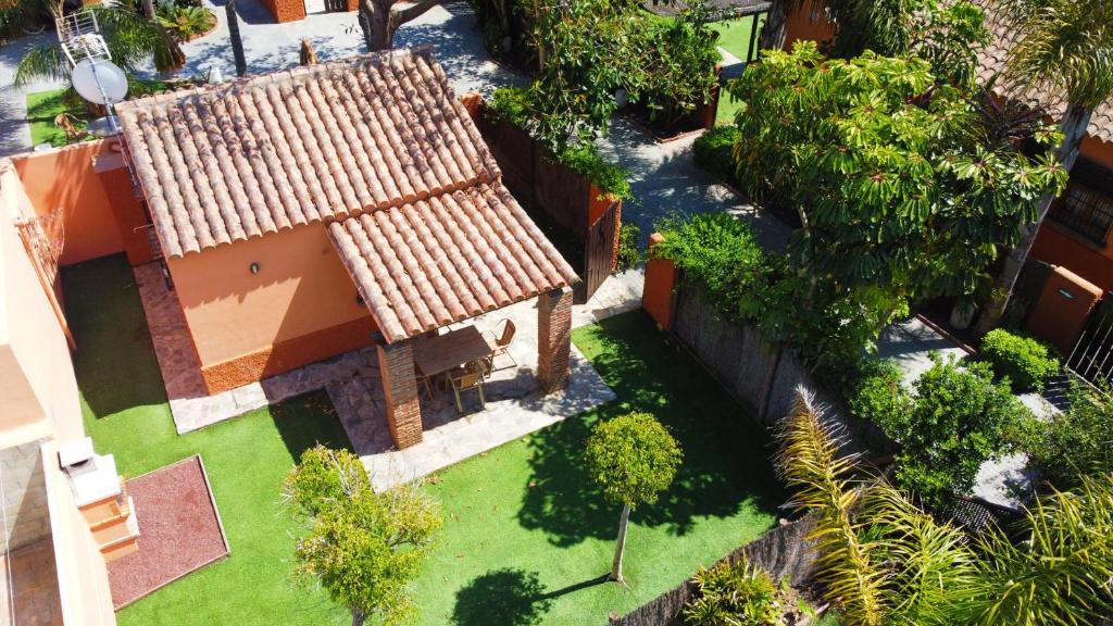 Casa o chalet Casita 6 con jardin privado grande en frente de la piscina y BBQ en Playa Palmar