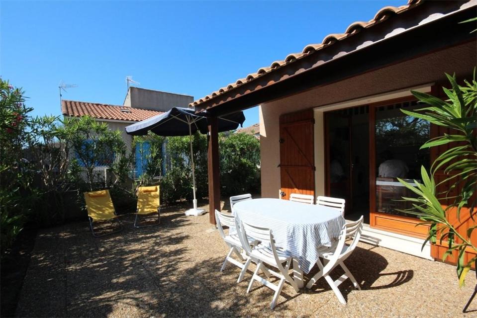 Villa Belle villa climatisée 5 couchages belle terrasse ombragée parking dans résidence sécurisée piscine commune à 400m de la mer LRJP23