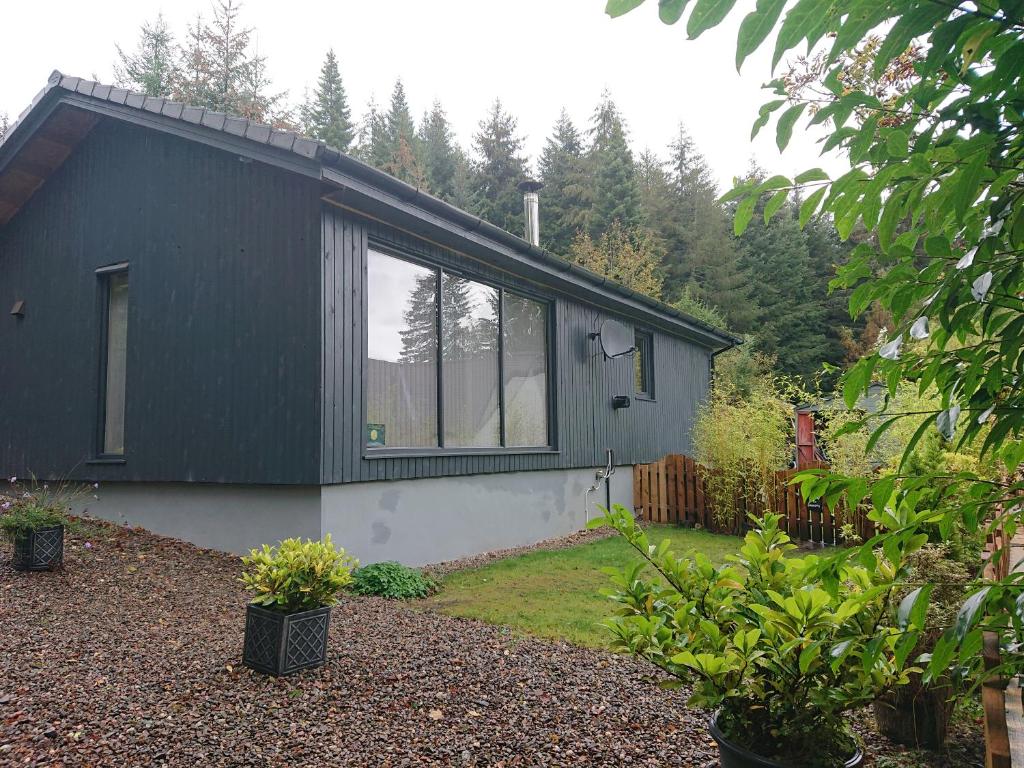 Lodge Loch Ness Highland Cottages with partial Loch View