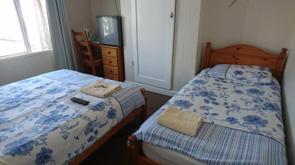 Hostal o pensión Room in Guest room - Comfortable Family room with Tv, Free Fast Wifi, Sleeps 4 with 1 Bunk Bed