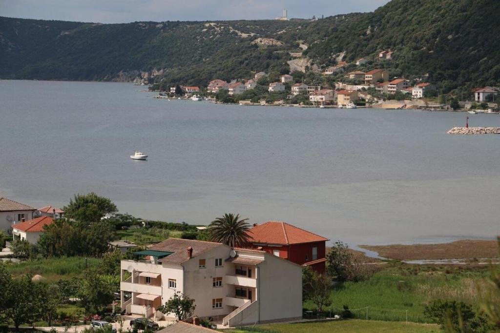 Apartamentos Apartments with a parking space Supetarska Draga - Donja, Rab - 5060